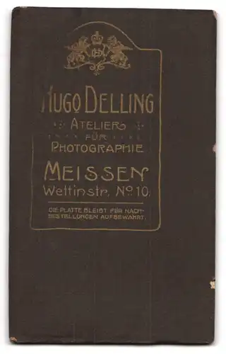 Fotografie Hugo Delling, Meissen, Wettinerstrasse 10, Kleiner Lockenkopf auf einem Fell