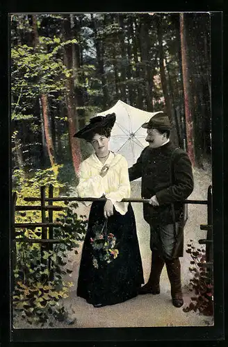 AK Dame mit Schirm neben einem Waidmann