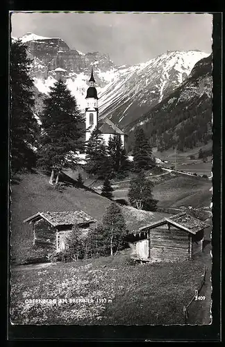 AK Obernberg am Brenner, Kirche vor Bergkulisse