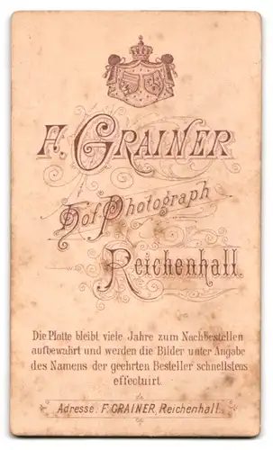 Fotografie F. Grainer, Reichenhall, Kleines Mädchen im Kleid mit einem Kleinkind