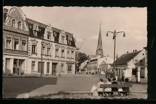 AK Torgelow /Krs. Ückermünde, Luxuswarengeschäft und Kirche am kleinen Markt