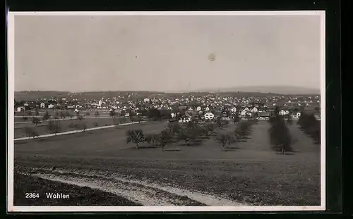 AK Wohlen, Ortsansicht mit Landstrasse aus der Ferne