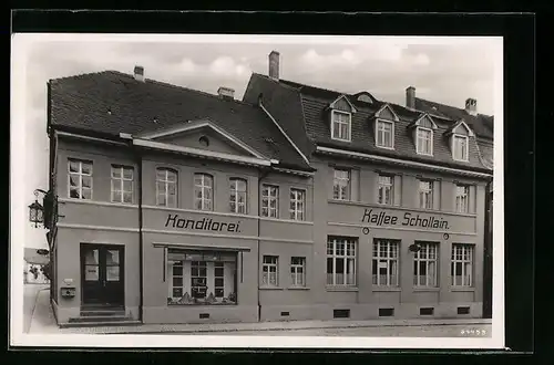 AK Buttstädt, Kaffee-Konditorei Schollain mit Strasse