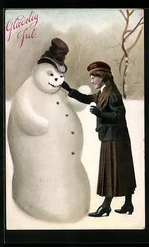 AK Dame baut einen Schneemann