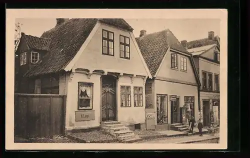 AK Neustadt / Holstein, Häuser in der Brückstrasse, Fahrradgeschäft