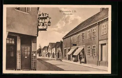 AK Westerstede i. O., Peterstrasse mit Gasthaus und Geschäft