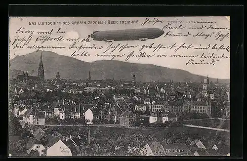 AK Freiburg, das Luftschiff des Grafen Zeppelin über der Stadt