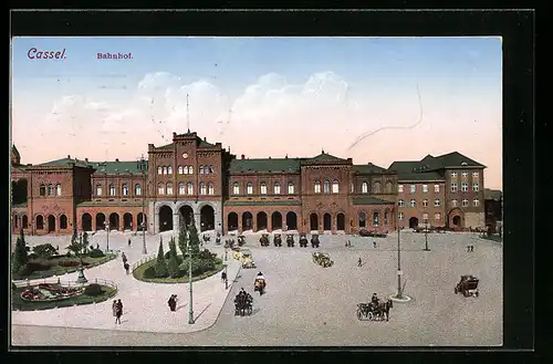 AK Cassel, Bahnhof mit Kutschen auf der Strasse