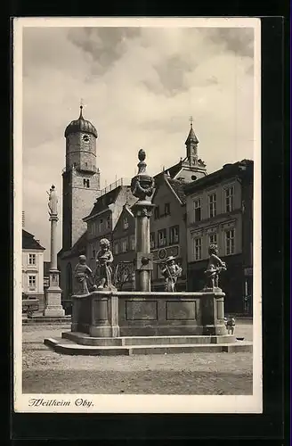 AK Weilheim /Obb., Brunnen vor Uhrturm