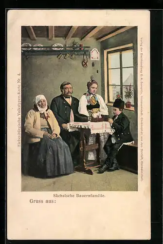 AK Sächsische Bauernfamilie in Tracht an einem Tisch sitzend