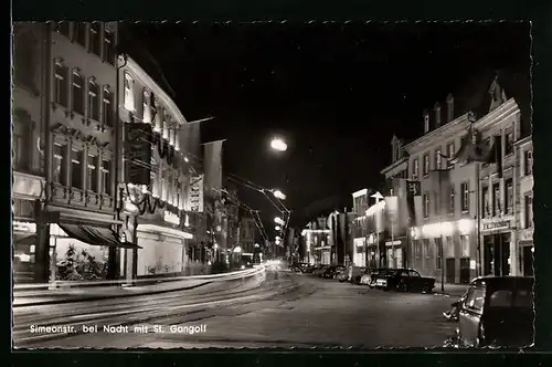 AK Trier /Mosel, Simeonstrasse bei Nacht mit St. Gangolf, Blick von der Porta Nigra