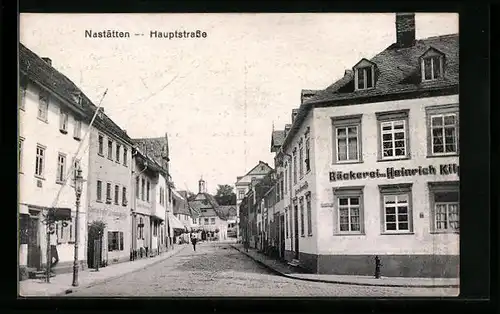 AK Nastätten, Hauptstrasse mit Turmgebäude und Bäckerei