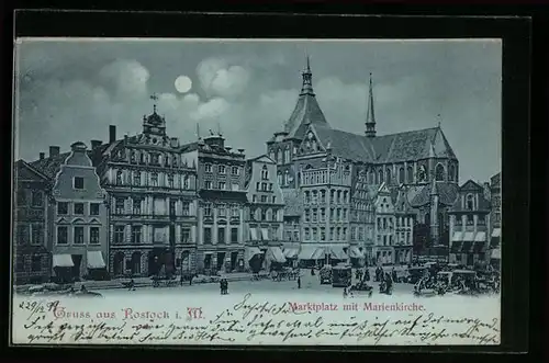 Mondschein-AK Rostock i. M., Marktplatz mit Geschäften und Marienkirche