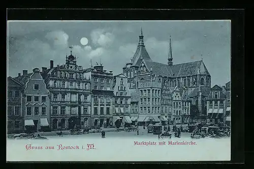 Mondschein-AK Rostock i. M., Marktplatz mit Geschäften und Marienkirche