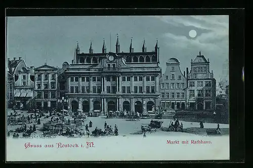 Mondschein-AK Rostock i. M., Markt mit Geschäften und Rathaus