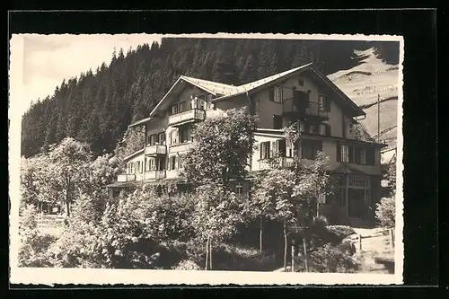 AK Adelboden, Das Hotel Edelweiss-Schweizerhof unter einer Schneedecke