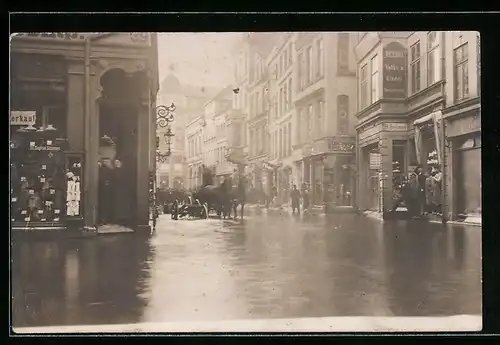 Foto-AK Kiel, Hochwasser 1911, Holstenstrasse mit Geschäften