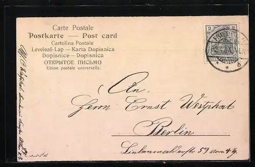 Künstler-AK Osterhase bemalt ein Osterei