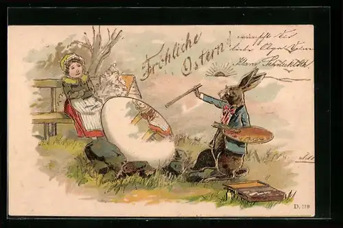 Künstler-AK Osterhase bemalt ein Osterei