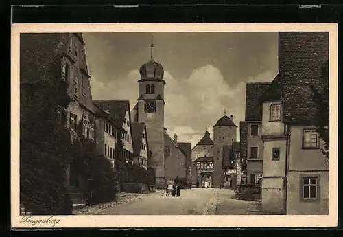 AK Langenburg, Strassenpartie mit Kirche und Wehrturm