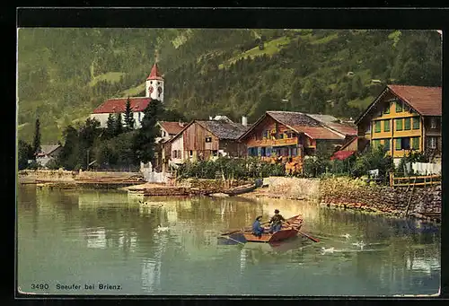 AK Brienz, Ruderpartie am Seeufer, mit Kirche