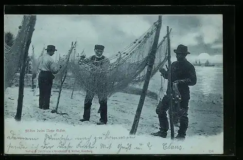 AK Fischer beim Netze flicken