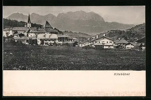 AK Kitzbühel, Ortspanorama mit verhangenen Bergen