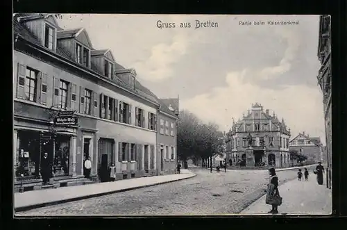 AK Bretten, Bahnhofstrasse mit Kaiserdenkmal, Friseur Wilhelm Walz