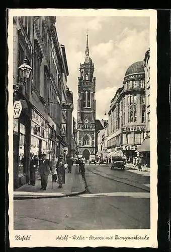 AK Krefeld, Strasse mit Cafe und Dionysuskirche