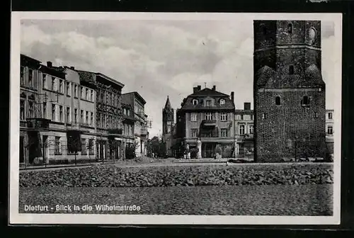 AK Dietfurt, Blick in die Wilhelmstrasse mit Kirchturm, Gebäudepartie
