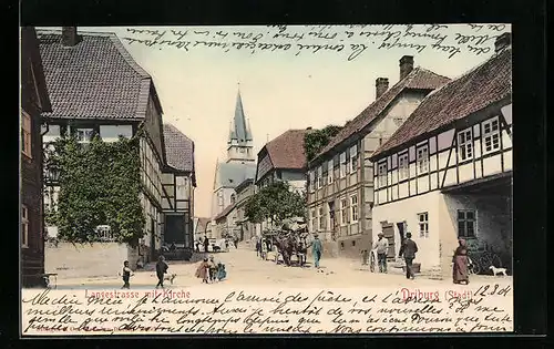 AK Driburg, Langestrasse mit Kirche, Fuhrwerk, Passanten