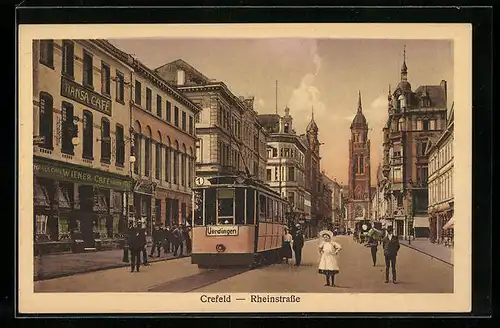 AK Crefeld, Rheinstrasse mit Hansa-Cafe / Wiener Cafe und Strassenbahn