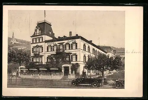 AK Rüdesheim a. Rh., Blick auf Hotel Jung, Nähe der Schiffslandestellen