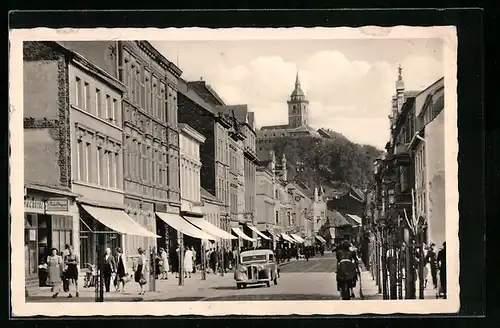 AK Siegburg, Kaiserstrasse mit Geschäften und Michaelsberg