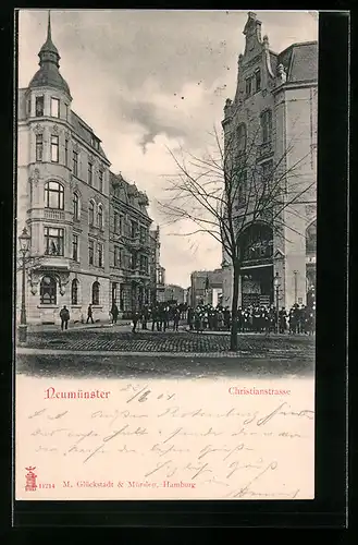 AK Neumünster, Christianstrasse mit Passanten