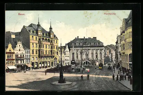 AK Bonn, Marktplatz mit Geschäft und Denkmal, Strassenbahn