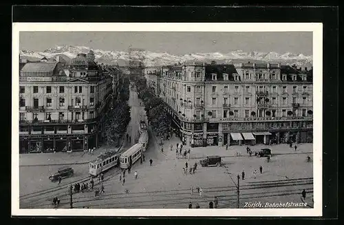 AK Zürich, Bahnhofstrasse mit Hotel Schweizerhof Terminus und Strassenbahn
