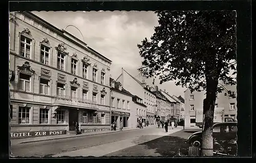 AK Bitburg /Eifel, Hauptstrasse mit Hotel Zur Post