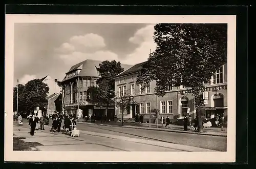AK Wittenberge, Bahnstrasse mit Häuser- und Geschäftsfassaden