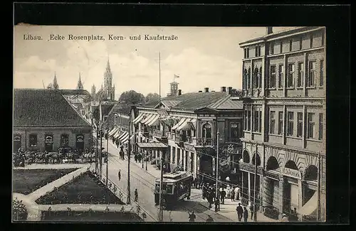 AK Libau, Zigarrengeschäft Ecke Rosenplatz, Korn- und Kaufstrasse mit Strassenbahn