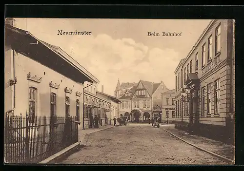 AK Neumünster, Strassenpartie am Bahnhof mit Selck`s Hotel