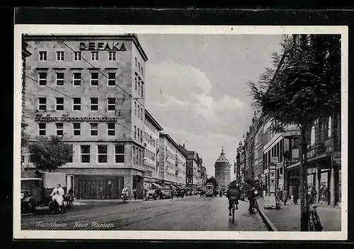 AK Mannheim, Strasse Neue Planken mit Geschäften und Strassenbahn