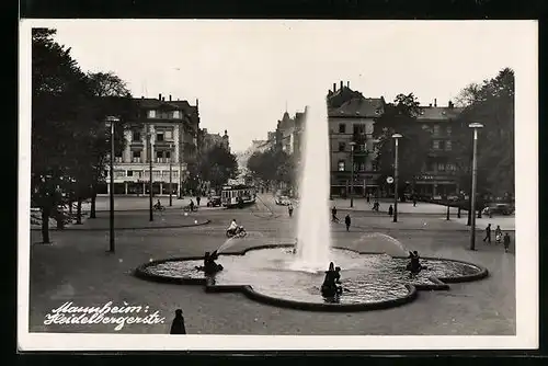 AK Mannheim, Heidelbergerstrasse mit Brunnen und Strassenbahn