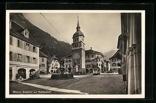 AK Altdorf, Dorfplatz mit Telldenkmal und Strassenbahn