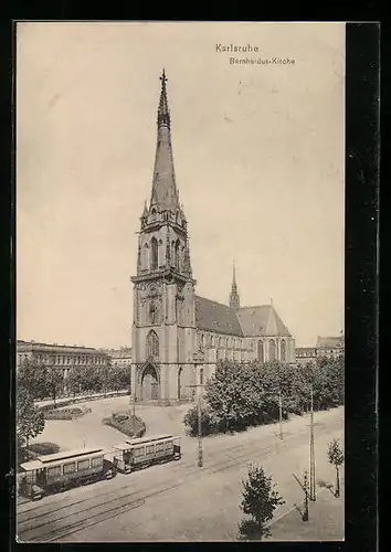 AK Karlsruhe, Bernhardus-Kirche mit Strassenbahn