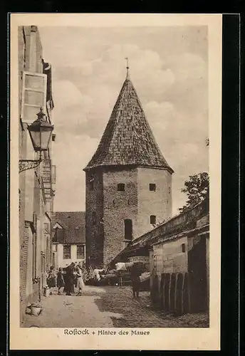 AK Rostock, Hinter der Mauer, Strassenpartie mit Turm