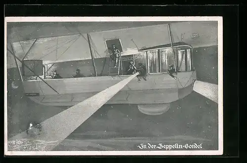 AK Luftschiffer leuchten mit einem Scheinwerfer aus der Zeppelin-Gondel