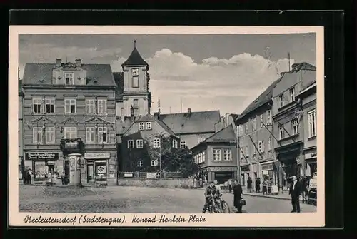 AK Oberleutensdorf / Litvinov, Konrad-Henlein-Platz mit Buchhandlung J. Schneider
