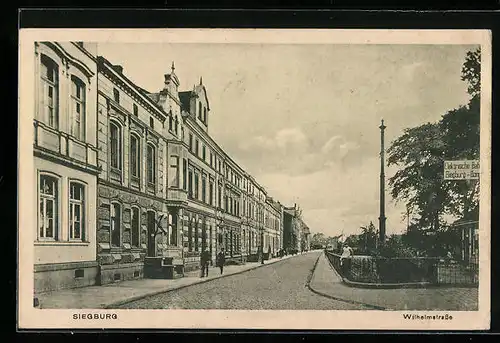 AK Siegburg, Partie in der Wilhelmstrasse, mit Eingang zum Bahnhof Elektrische Bahn