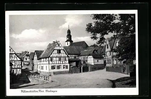 AK Kilianstädten, Strassenpartie mit Fachwerkhäusern und Kirchturm